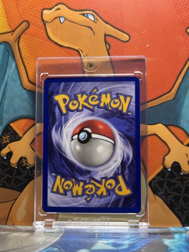 Poke Ball Jungle 1st Edition NM 64/64 Pokemon Card.