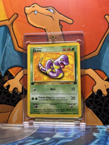 Ekans Team Rocket 1st Edition NM, 56/82 Pokemon Card.